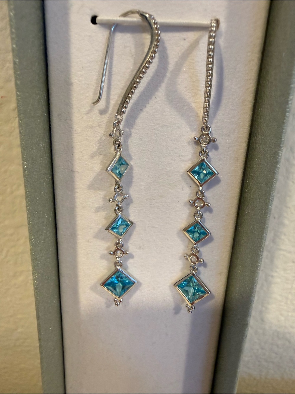 Judith Ripka Silver Drop Earrings with Teal-Blue Stones